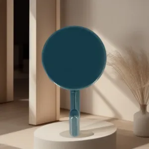 Detailed view of the dark blue rotary wall hook displayed on a clean minimalist pedestal.