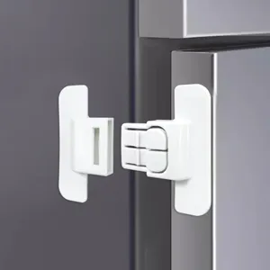 White plastic child safety lock detail for refrigerator door and drawers, punch-free design.