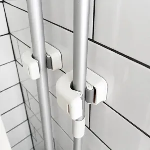 Wall mounted mop holder broom clip punch free bathroom organizer for daily cleaning tools main view