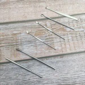 Stainless steel ear pick set detail, versatile ear curette cleaning tools for daily hygiene.