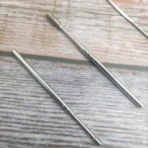 Stainless steel ear pick detail showing spring and spoon tips for daily ear cleaning tool.