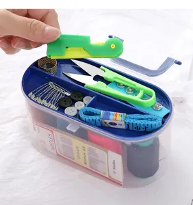 Portable household sewing kit set with scissors needles tape measure and threads for DIY.
