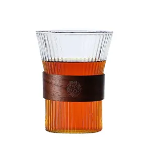 Vertical striped glass drinking cup with wooden heat insulation sleeve for coffee and tea