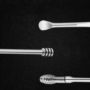 Stainless steel ear pick set and professional curette tools close up view for daily hygiene