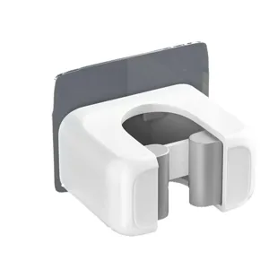 Wall-mounted mop holder and broom gripper for bathroom, punch-free wall organizer rack.