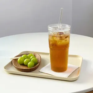 Transparent ribbed glass water cup with lid and straw, large capacity for office or home daily use.