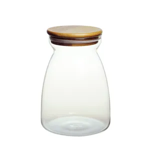 Clear glass storage jar with bamboo lid, perfect for kitchen pantry organization and dry food.