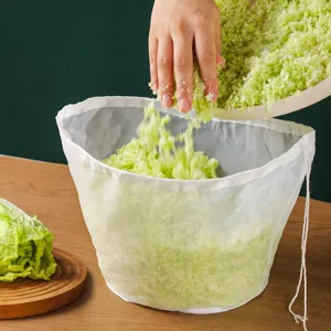 Large diameter kitchen food strainer bag with drawstring for vegetable water straining mesh.