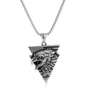 Stainless steel eagle pendant necklace closeup detail showing fierce head and flag design.