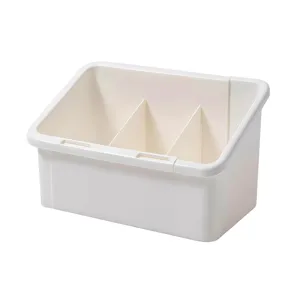 Retractable desktop cosmetic storage box with adjustable compartments for makeup brushes.