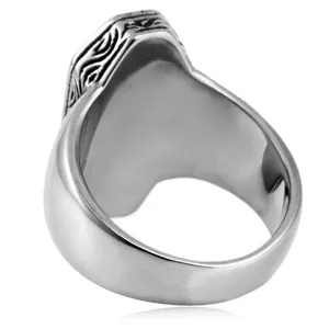 Retro stainless steel ring for men with carved top detail, durable metal band, stylish design.