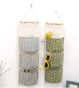 Borsa portaoggetti da appendere in cotone e lino multi tasca a muro per retroporta.