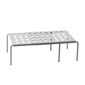 Under sink organizer shelf detail, telescopic metal rack with perforated surface design.