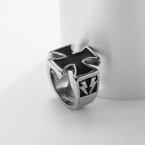 Detail shot of the stainless steel men's ring featuring an iron cross and lightning design.