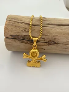 Collier pendentif tête de mort en acier titane doré style rétro punk os de croix bijoux