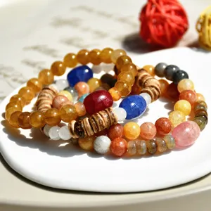 Retro bunter Kristall Rissstein und Holz Perlen Armband Paar chinesischer Stil Schmuck.