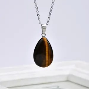 Exquisite brown tiger's eye teardrop pendant necklace detail view showcasing natural stone.