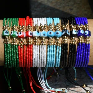Pulseras artesanales de cuentas multicapa con mal de ojo y cuerdas trenzadas para mujeres.