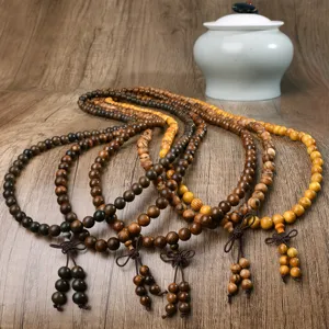Exquisite 108 wooden prayer beads bracelets featuring natural wood grains, vintage zen style detail.