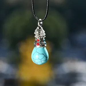 Collier pendentif goutte de turquoise rétro ethnique avec cordon noir accessoire spirituel