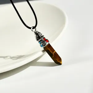 Natural stone tiger eye hexagonal pillar pendant necklace detailed shot showcasing crystal texture.