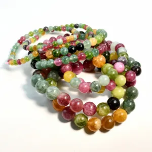 Colorful natural tourmaline bead bracelets detail view, vibrant gemstone multi-color elastic jewelry
