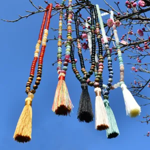 Catena maglione lunga perlata in stile boho vintage con nappe colorate da donna, pietra.