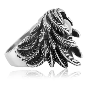 Detailed view of the stainless steel gothic skull ring with intricate wing carvings.