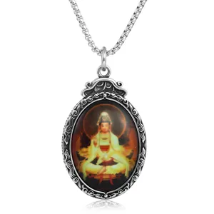 Collar colgante vintage de acero inoxidable con retrato de divinidad religiosa thangka.