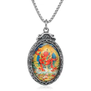 Collar con colgante thangka vintage de acero inoxidable con arte de deidad religiosa colorida.