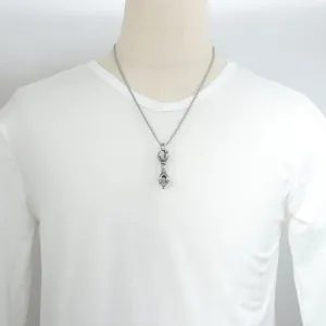 Stainless steel punk style vajra pendant necklace for men and women, cool fashion jewelry accessory.