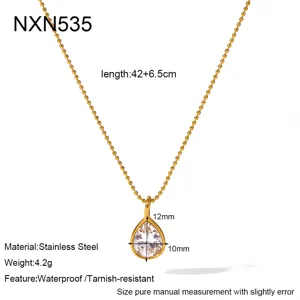 Detail view of minimal stainless steel teardrop zircon pendant necklace with bead chain.