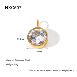 Close-up detail of the round stainless steel bezel set cubic zirconia pendant, 11.4mm size.