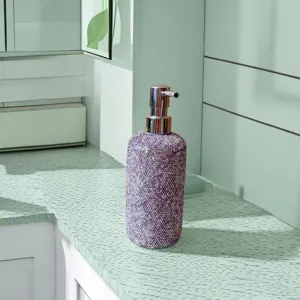 Decorative rhinestone soap dispenser bottle with pump for bathroom lotion and liquid soap.