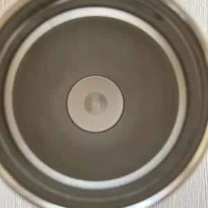 Stainless steel tumbler interior detail, food grade 304 material mark closeup view