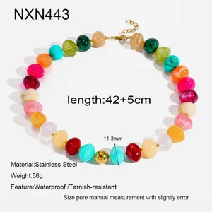Colorful acrylic beaded necklace with stainless steel spacers, stylish vacation jewelry detail.
