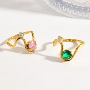 Exquisite 18k gold plated stainless steel wave rings with colorful cubic zirconia details.