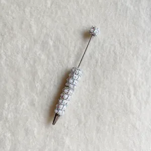 Rhinestone pearl beaded pen detail view, exquisite decorative writing tool for DIY crafts.