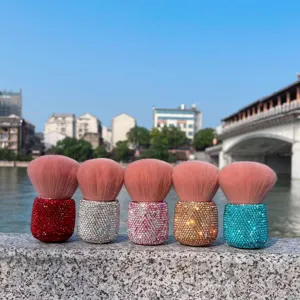 Colorful rhinestone kabuki makeup brush, fluffy powder and large blush tool detail view.