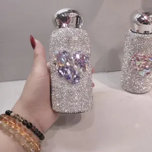 Rhinestone thermos flask with crystal heart design sparkling luxury water bottle for daily use.