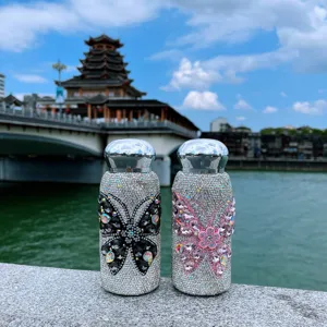 Sparkling rhinestone insulated pocket water bottle with luxury crystal butterfly design for outdoor.