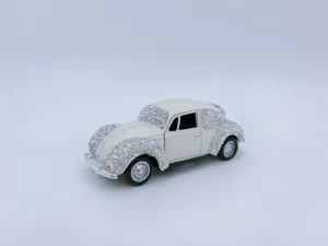 Rhinestone classic car ornament detail, sparkling crystal decoration for auto interior decor.