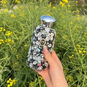 Detailed shot of rhinestones stainless steel insulated water bottle with luxury design.