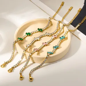 Closeup of 18K gold plated stainless steel tennis bracelets with colorful zircon stones.