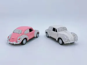 Rhinestone classic car alloy model ornament for car dashboard or interior decor, pink and white.