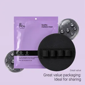 Professional round exfoliating bath mitt with elastic hand strap and waterproof packaging.