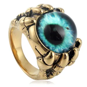 Detailed view of punk retro titanium steel dragon claw ring with blue demon eye glass stone.
