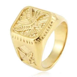 Gold stainless steel signet ring with vintage eagle motif and sunburst engraving for men.