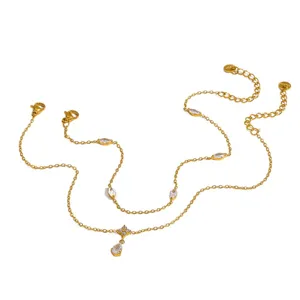 Catena da caviglia a doppio strato in acciaio inossidabile placcato oro 18K con zirconi.