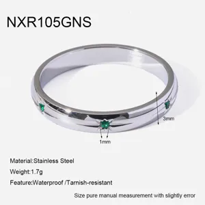 Stainless steel ring with green zirconia stones, minimalist 3mm band, waterproof design.